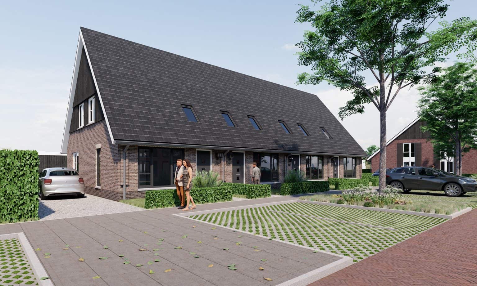 Moderne woongebouwen met groene tuin en parkeerplaatsen in Woonstaete.